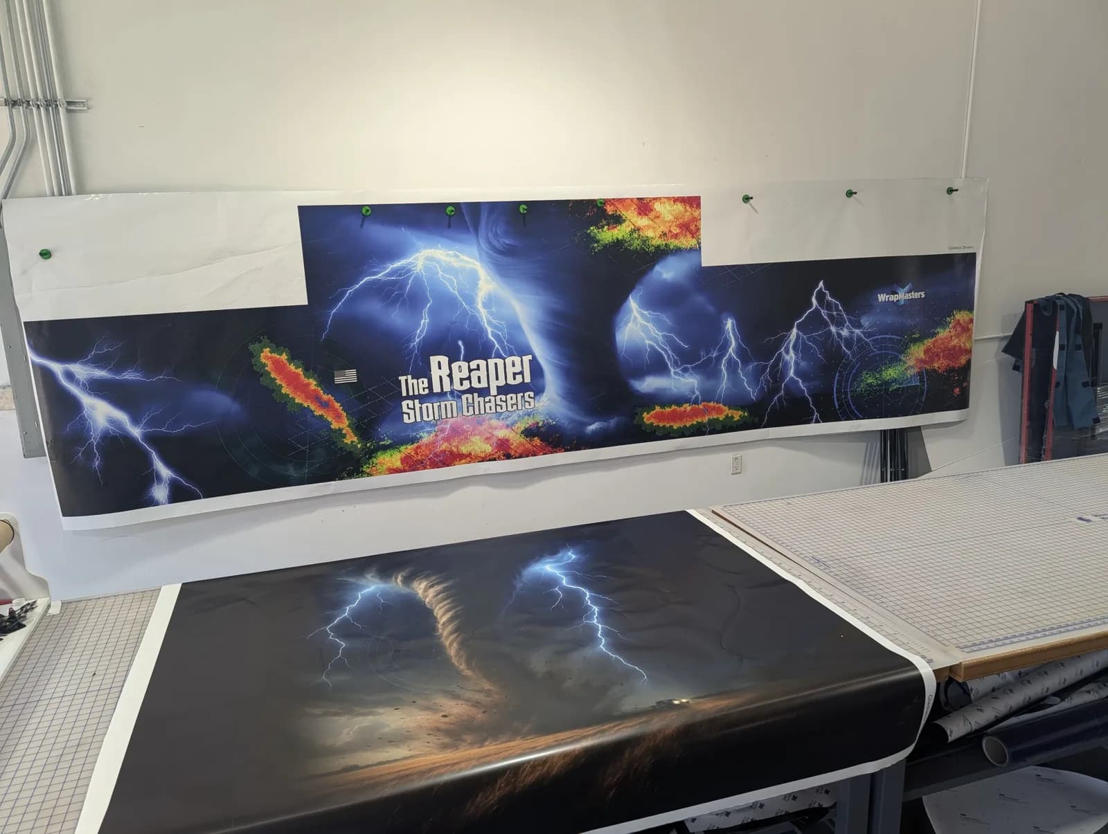 The Reaper Storm Chasers Jeep Gladiator wrap with a tornado, lightning, and radar colors, by WrapMasters