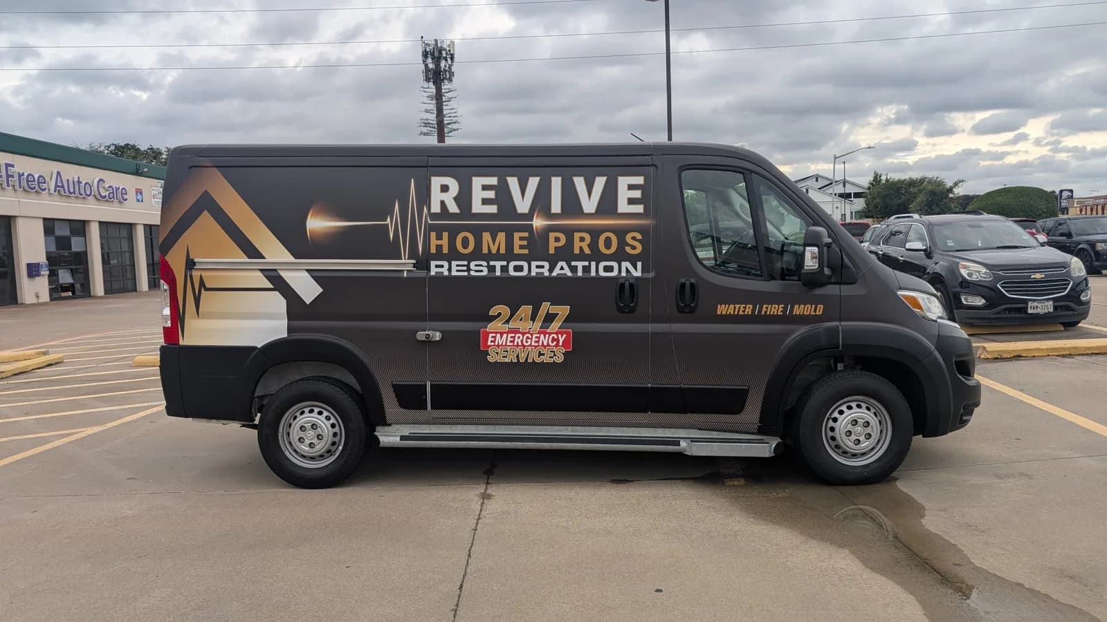 Revive Home Pros Restoration van wrap, driver side, matching the pickup