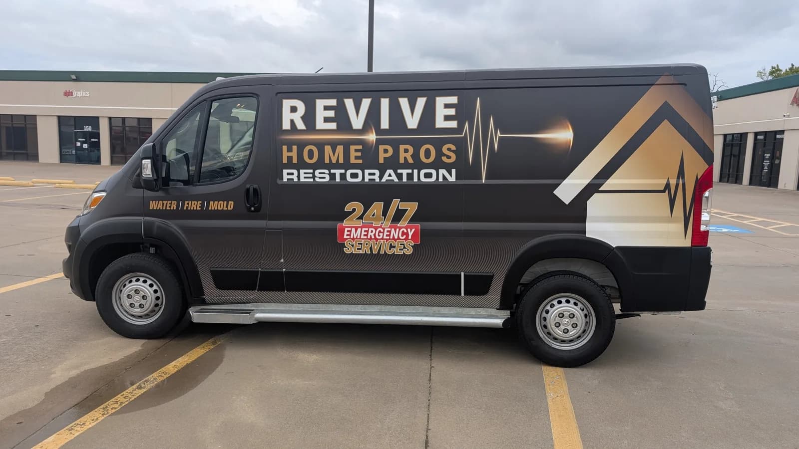 Revive Home Pros Restoration Ram ProMaster van wrap, passenger side