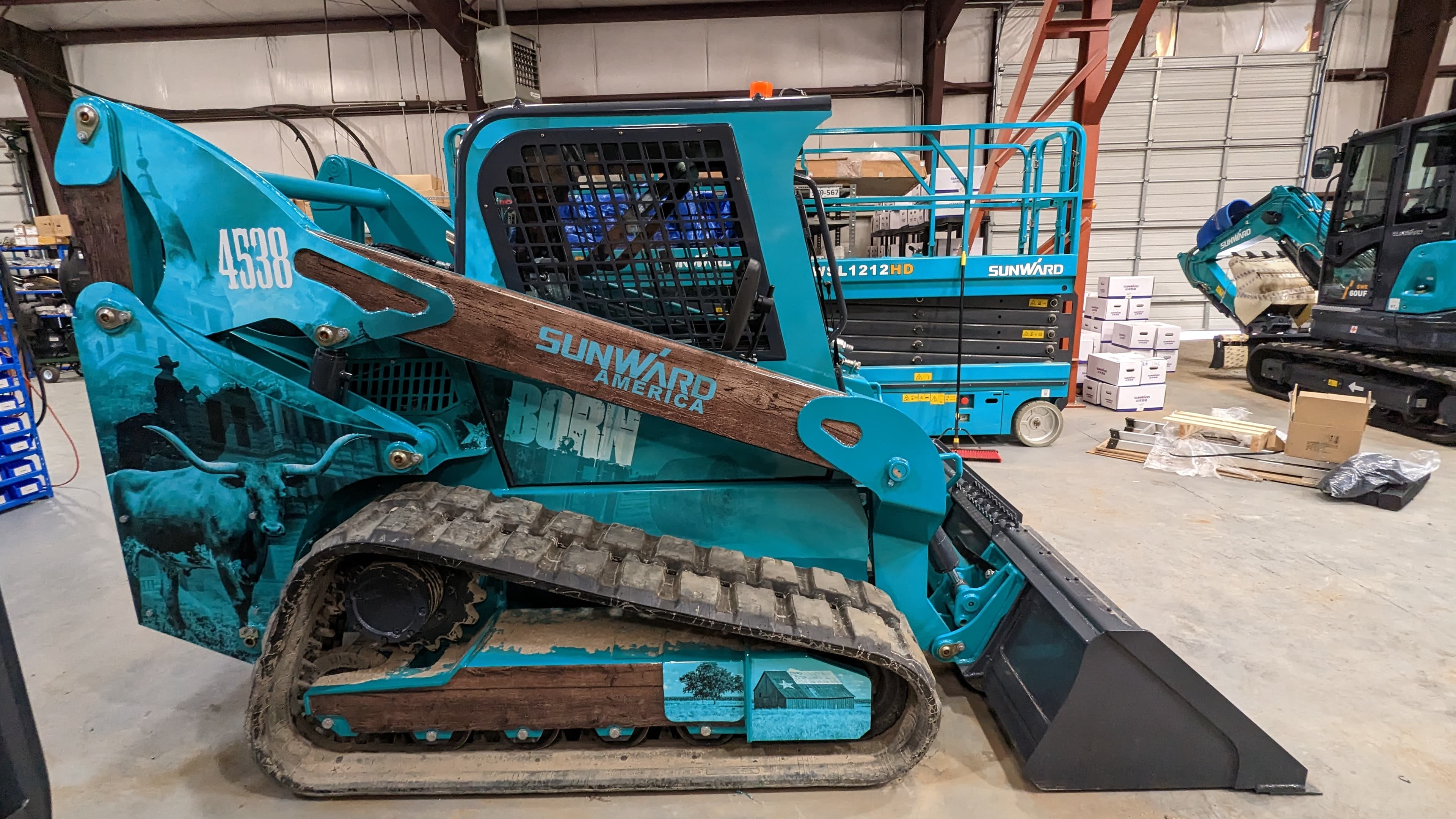 Sunward America skid steer equipment wrap with Texas western theme by WrapMasters